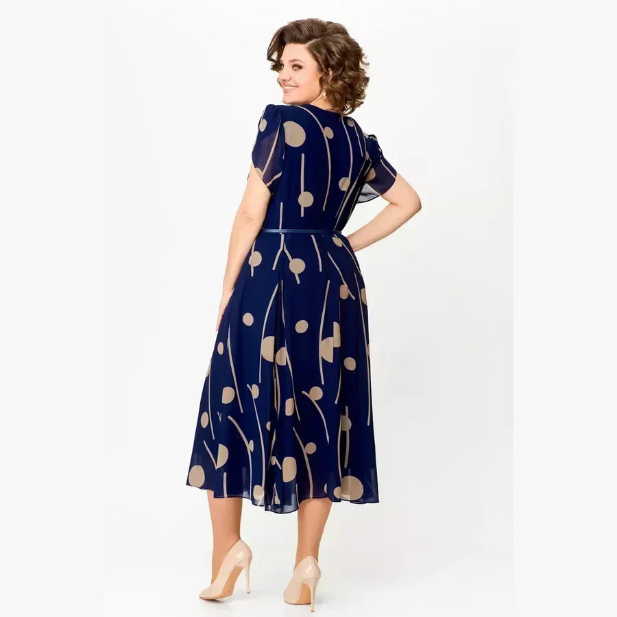 Evelyn navy polka dot midi dress, styled detail
