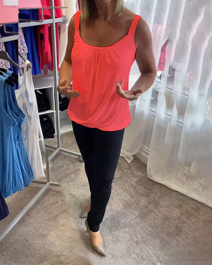Nancy pleated sleeveless top in coral, full-length front view