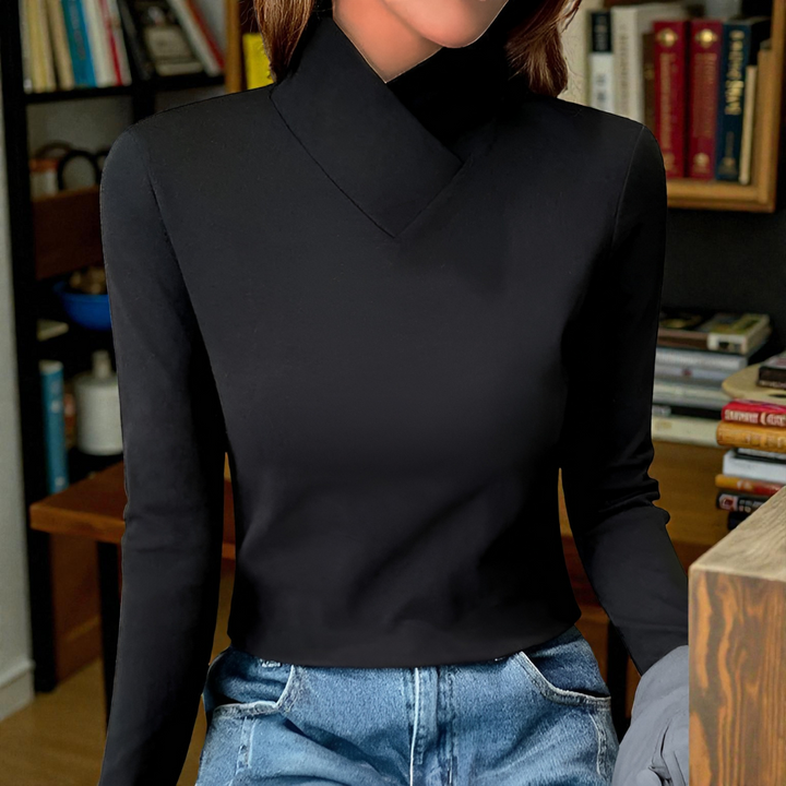 Winifred high-neck sweater shown in a soft, elegant fit