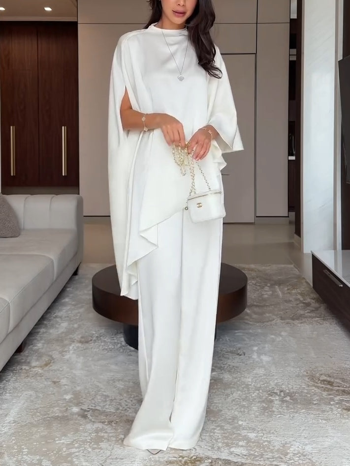 Eunice cape top and wide-leg trousers, side view