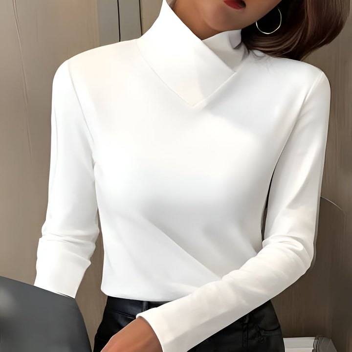 Winifred high-neck sweater, front view showing the fitted silhouette